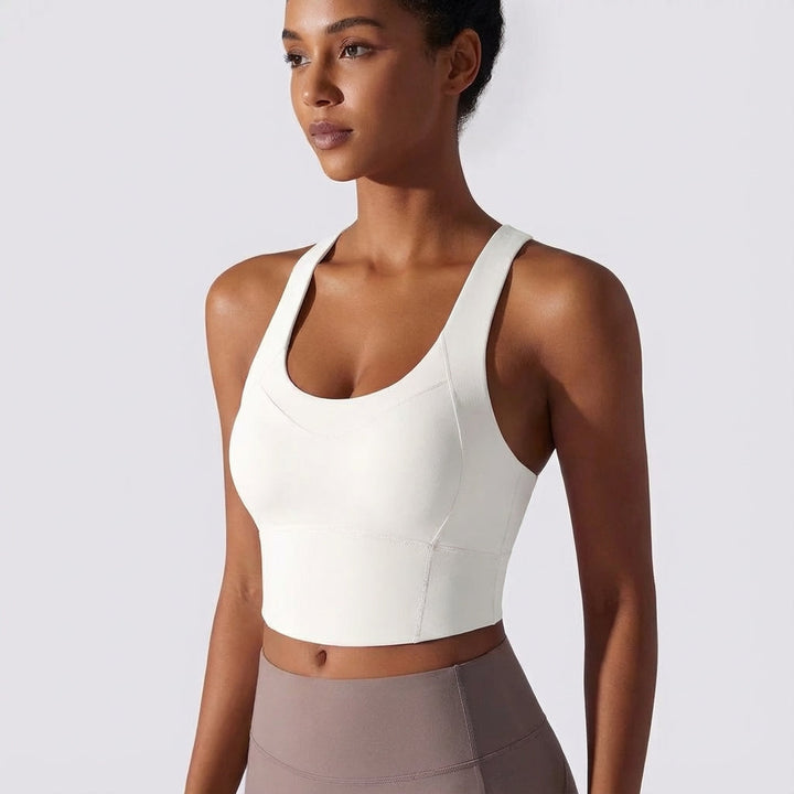 Women's seamless padded sports bra tank top in a vibrant color, great for workouts