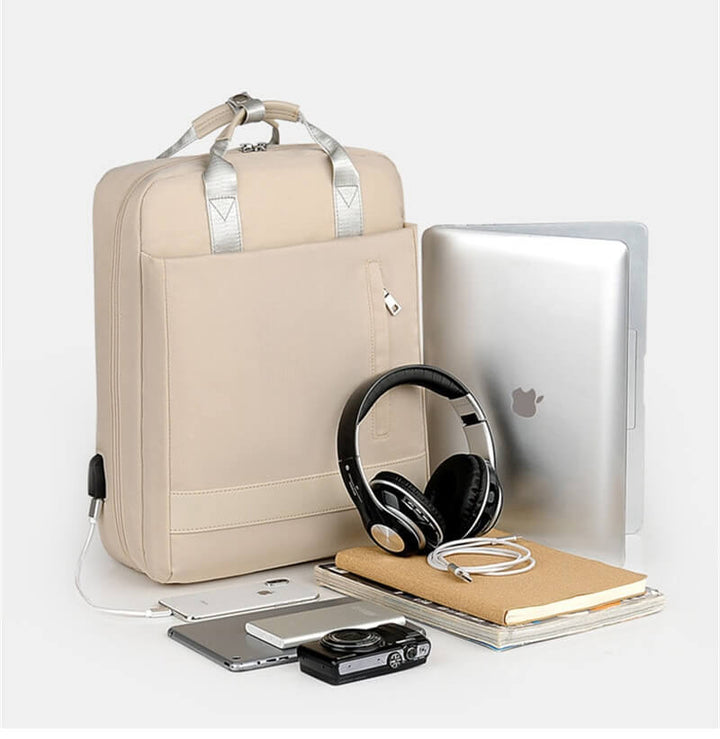 Durable oxford fabric anti-theft backpack, unisex design with USB charging, ideal for everyday travel.