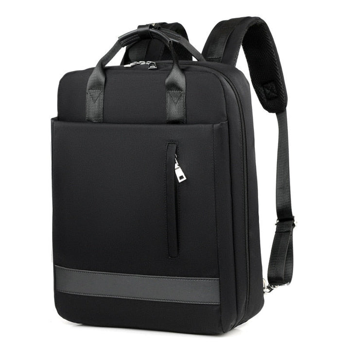Close-up of USB charging port on anti-theft backpack, perfect for on-the-go device power.