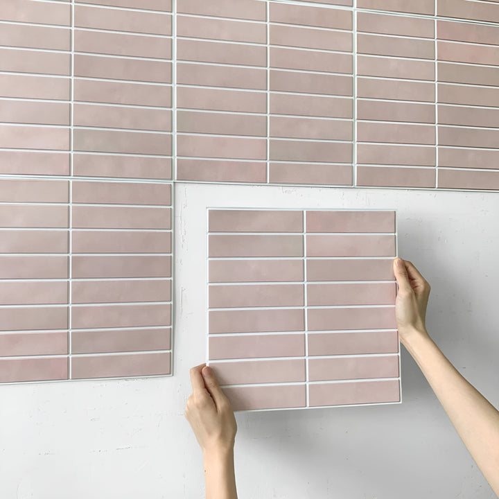 Stylish self-adhesive 3D ceramic look panels, water-resistant for kitchens and bathrooms.