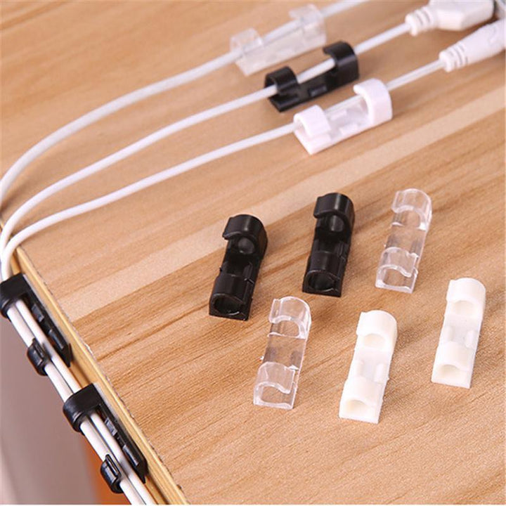 Pack of universal self-adhesive cord clips for tidy wire management in home office & electronics.