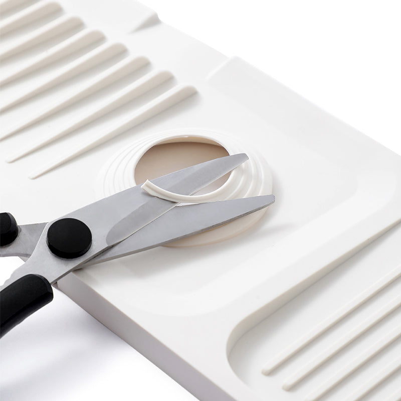 Home organization: Self-draining silicone mat, perfect for kitchen or bathroom countertop drying.