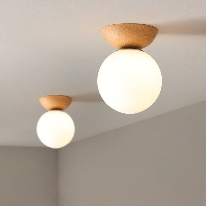 Serene Japanese LED ceiling lamp. Modern spherical wood design for home decor.