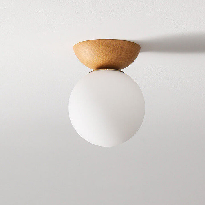 Modern LED ceiling light. Spherical Japanese design, brightens any room with soft light.