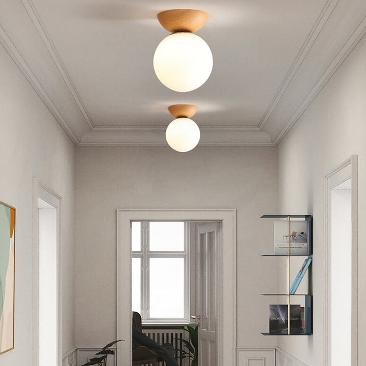 Spherical LED ceiling lamp. Japanese wood finish, brightens any living space.