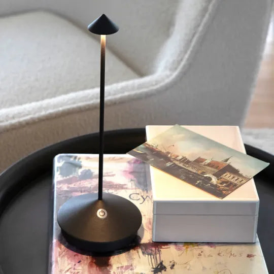 Energy-efficient Serenity LED table lamp, modern, rechargeable & dimmable for eco-friendly use.