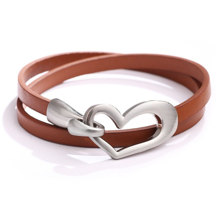 Elegant women's leather heart bracelet, a delicate fashion accessory. Perfect for daily wear.