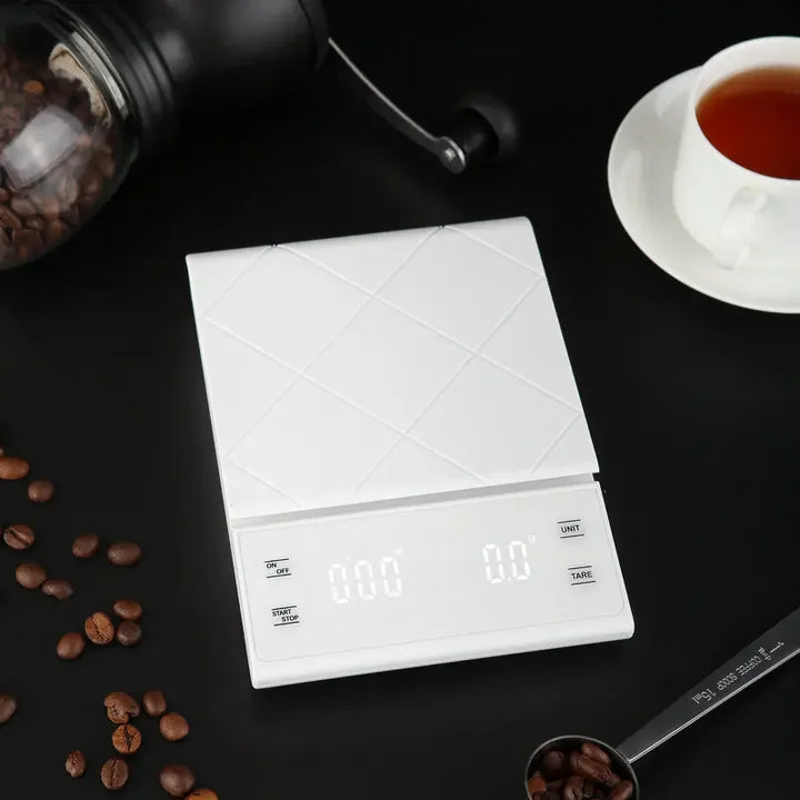 Modern electronic weight scale, great for precise coffee brewing & food prep. Essential measurement tool for home.
