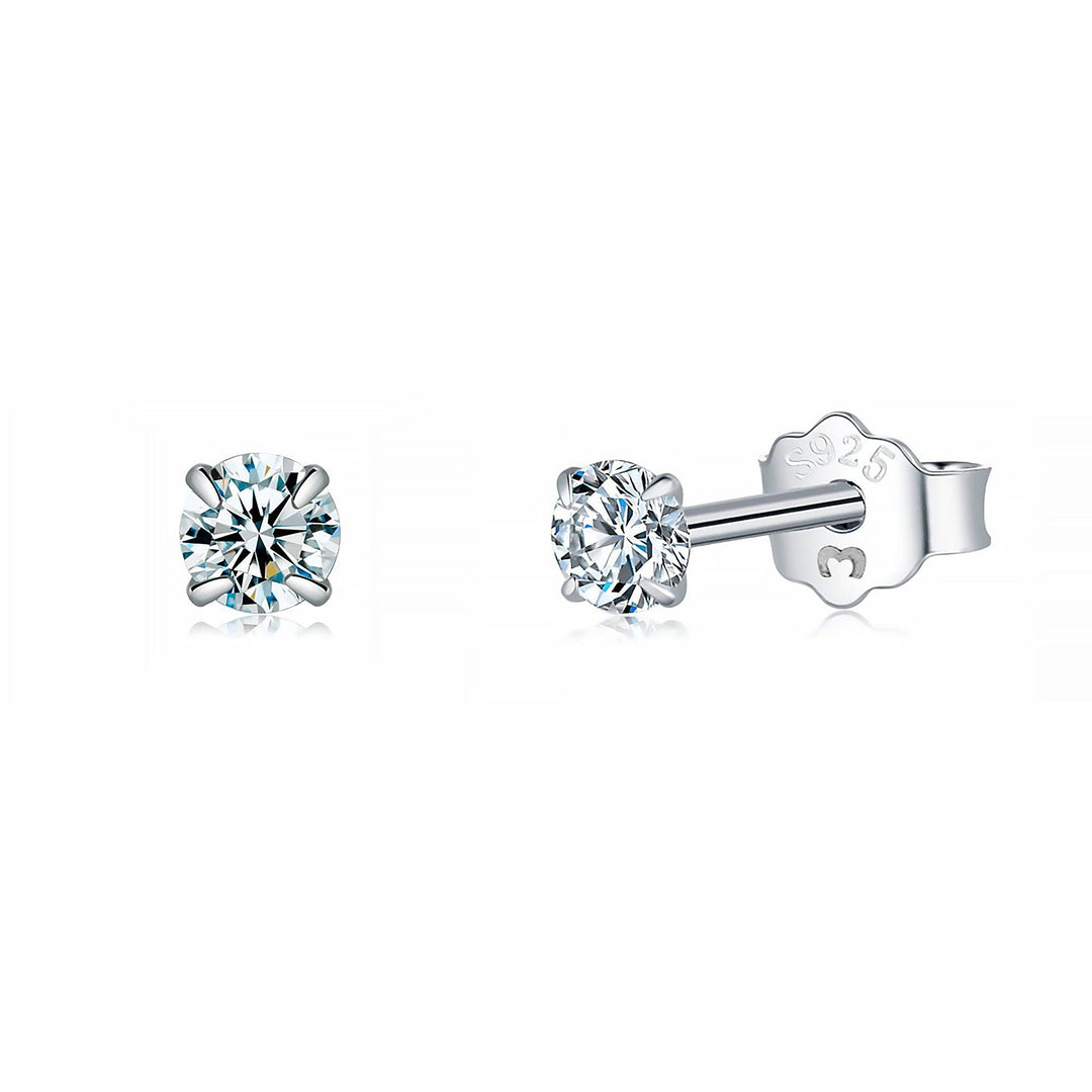 Classic zirconia stud earrings in gold plated finish, ideal women's jewelry.