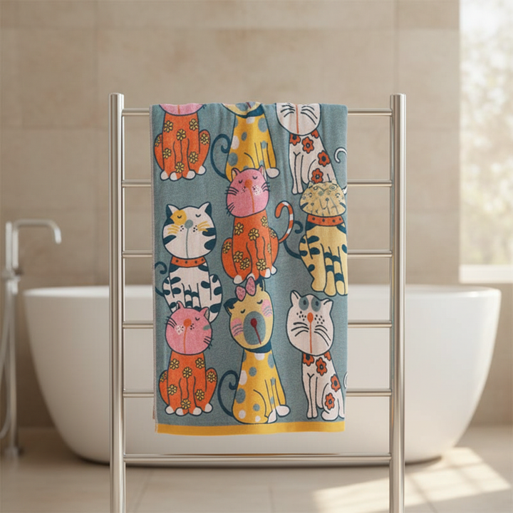 Soft cotton KittyWrap baby hooded bath towel with playful cat ears, perfect for nursery bath time