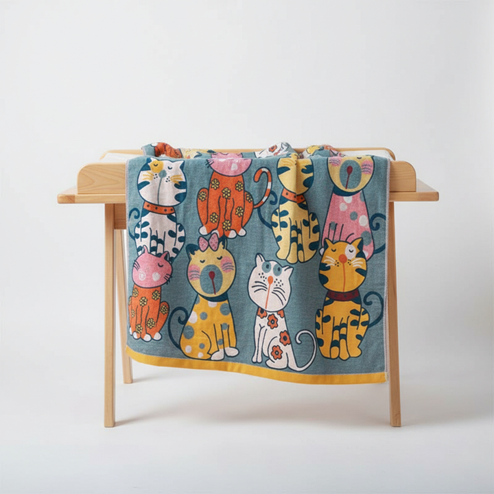 Quick dry KittyWrap baby animal hooded bath towel in gentle cotton, keeping babies warm and cozy