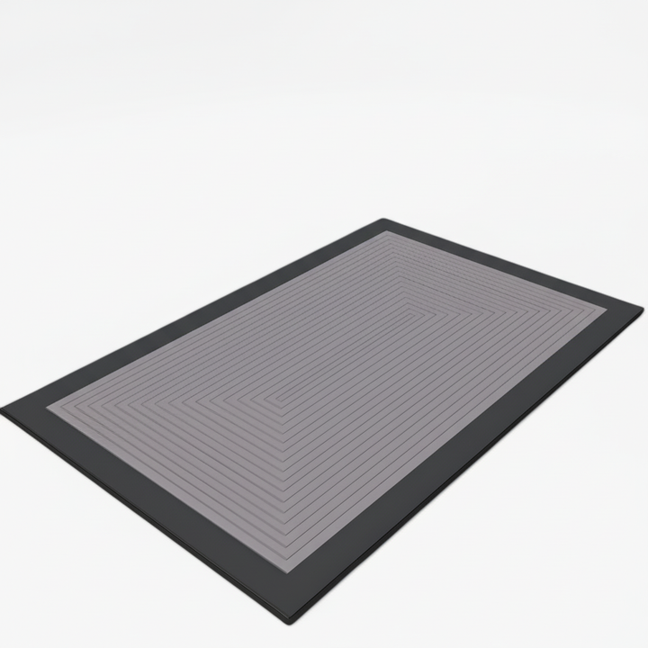Textured non-slip bath mat, soft to the touch, designed for bathroom safety and easy cleaning.