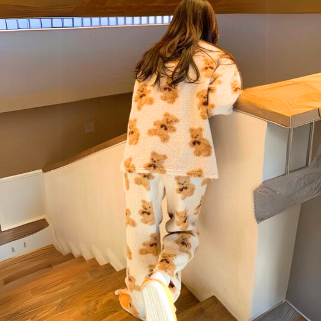 Comfortable women's velvet pajama set with an adorable bear print, perfect for cozy nights & cute sleepwear.