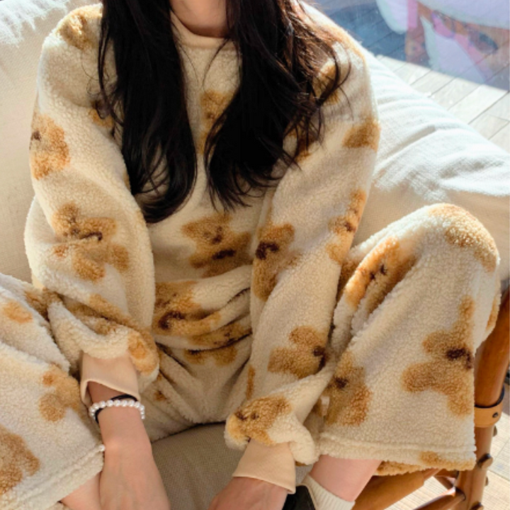 Plush velvet women's pajama set with a sweet bear print, luxurious and soft for ultimate comfort & sleep.
