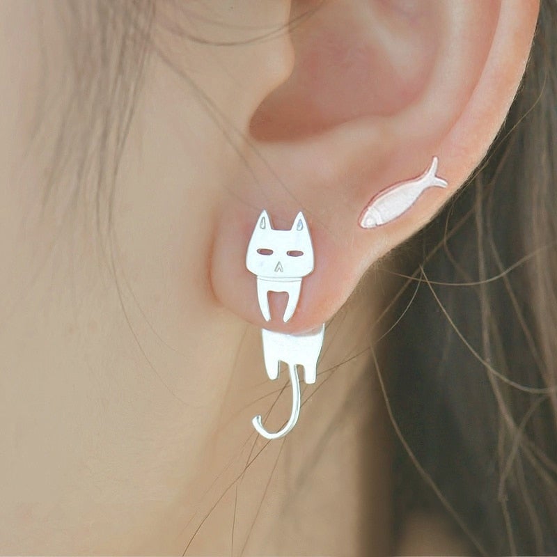Sterling silver climbing cat earrings for women. Whimsical feline jewelry, perfect unique gift for cat lovers.