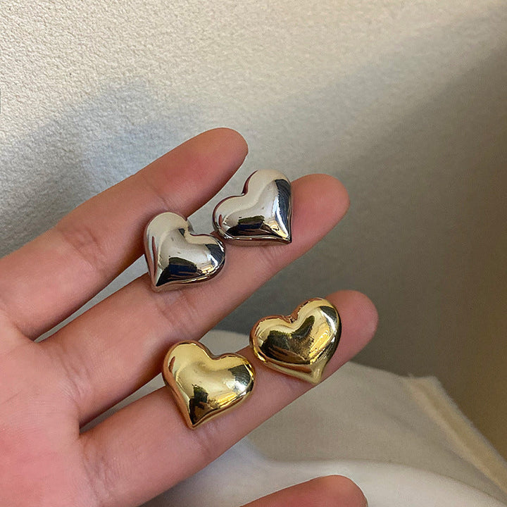 Women's sterling silver & gold plated heart dangle earrings, elegant fashion jewelry.