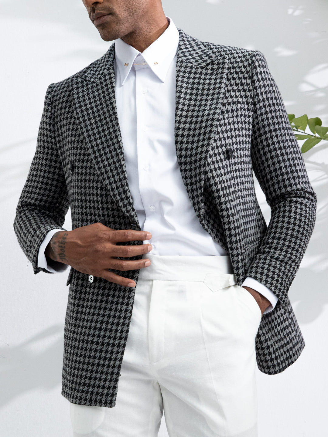Bold black and white checked men's blazer, a statement piece for stylish men's fashion & business.