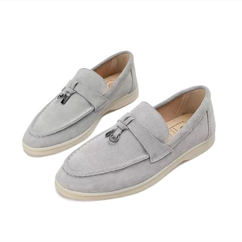 Close-up of the elegant clasp detail on a women's comfortable loafer, highlighting the premium design.