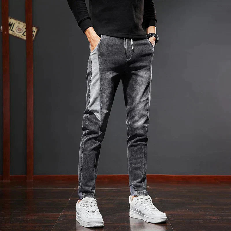 Black slim fit men's denim jeans. Versatile & comfortable casual wear, perfect for stylish men's everyday outfits.