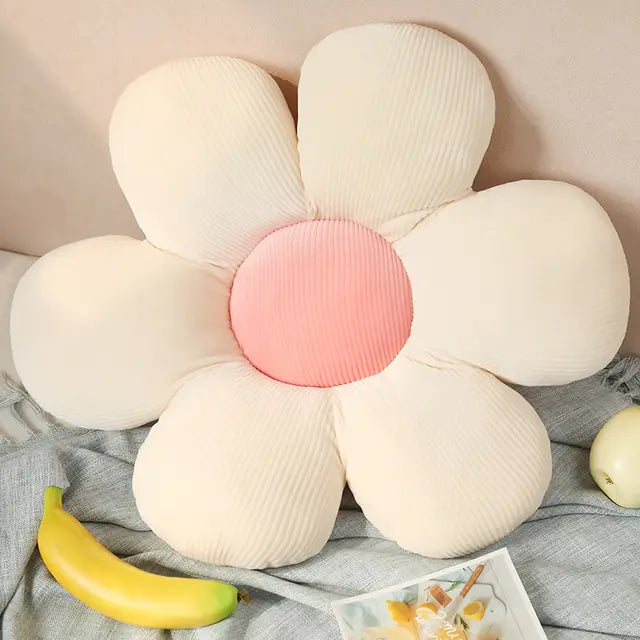 Unique floral decorative pillow for a cozy kids room.