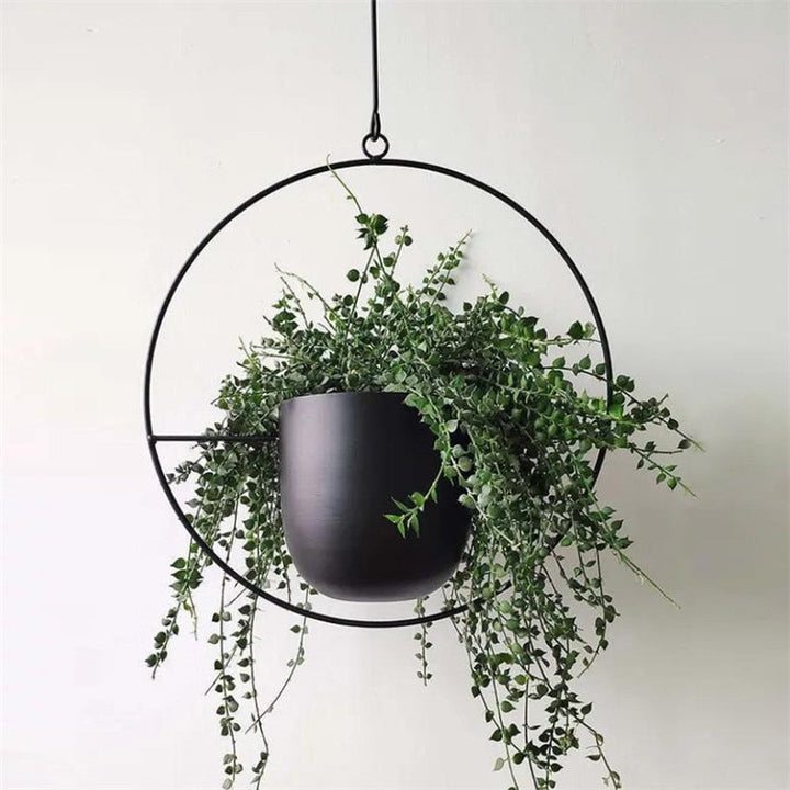 Decorative outdoor hanging plant holder, perfect for patio or balcony garden decor.