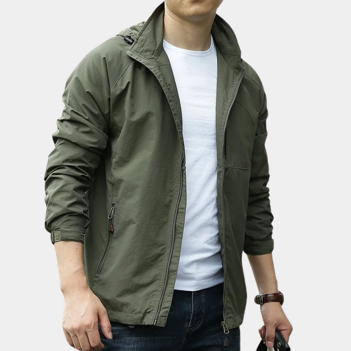 Weather-resistant men's mid-season jacket, combining comfort and style for fall adventures.