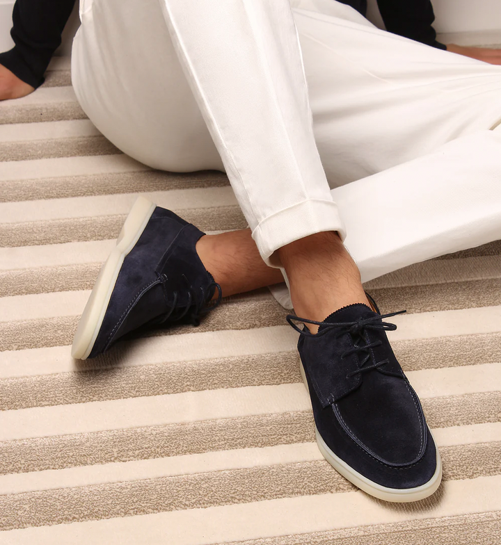 Stylish men's loafers in rich brown leather, perfect for effortless elegance & versatile everyday wear.