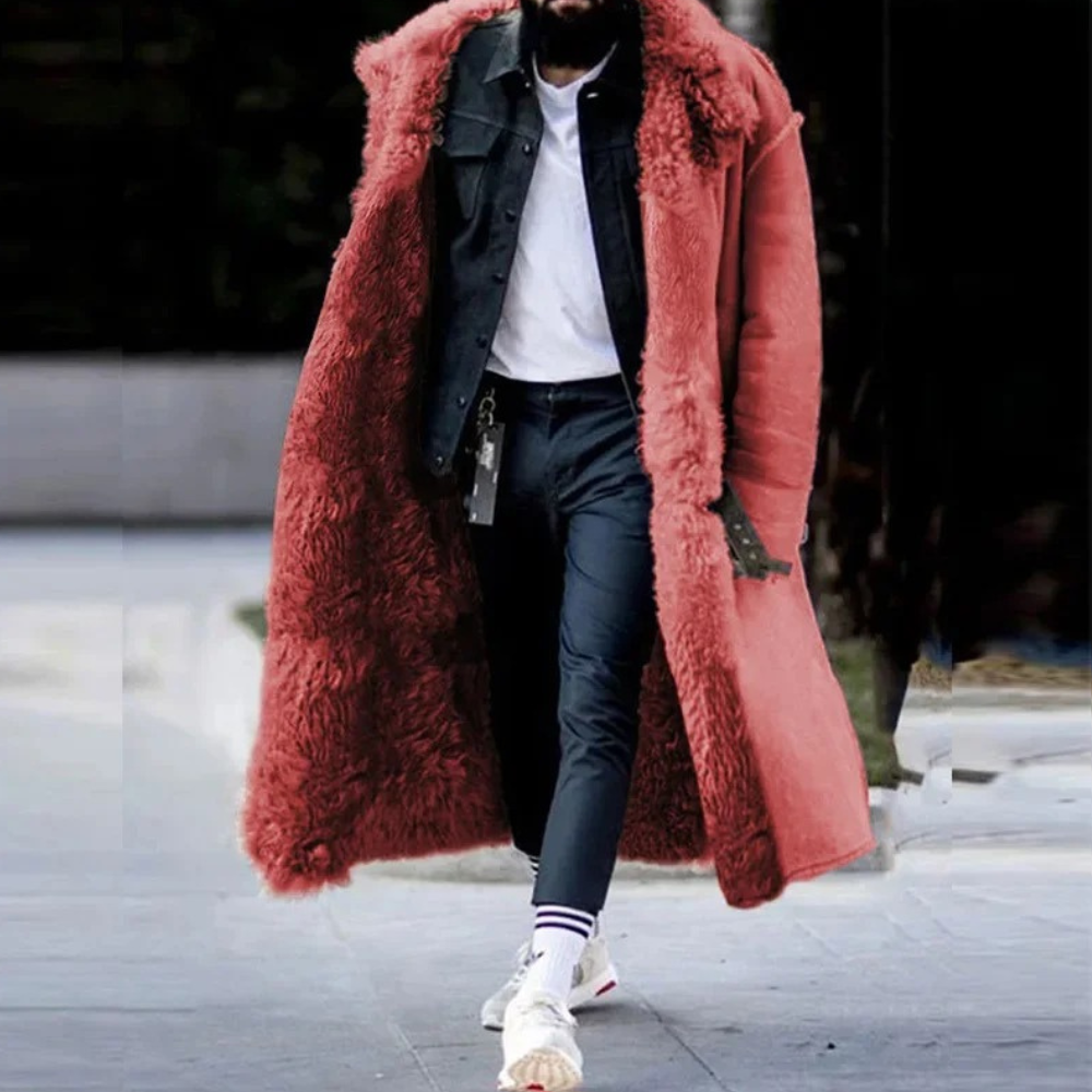 Front view of a man wearing a black stylish long winter warm padded coat, for ultimate cold weather.