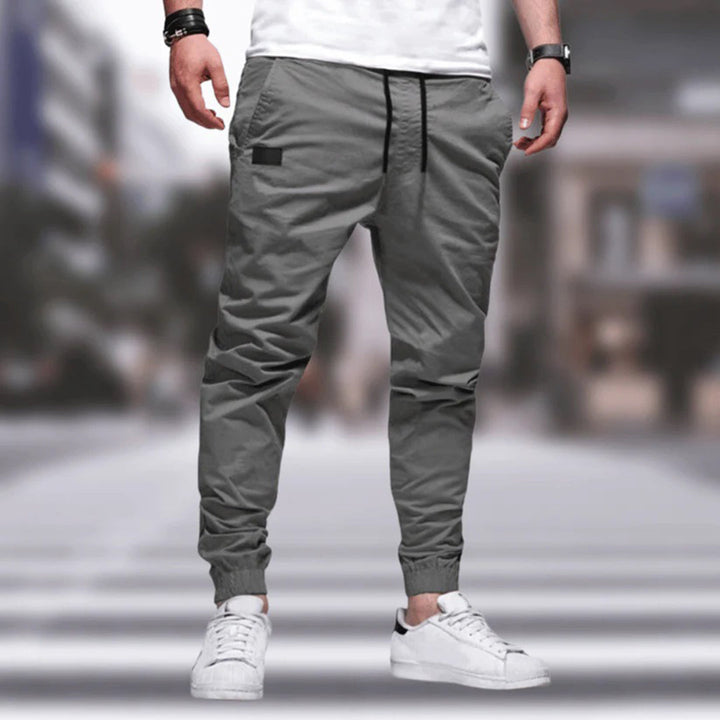Stylish men's utility cargo trousers, perfect for casual wear, streetwear, and everyday comfort.