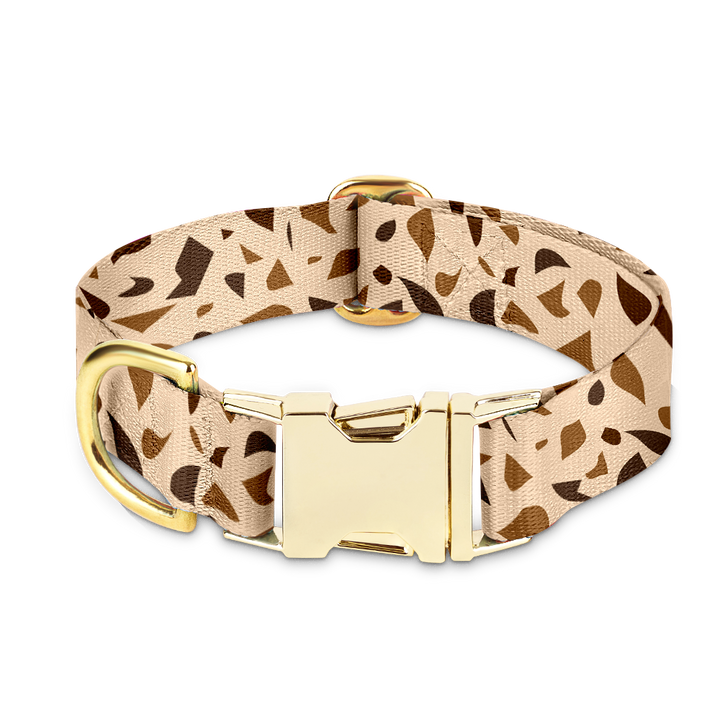 Stylish unisex dog collar with unique terrazzo pattern & golden brass hardware. Durable & washable pet accessory.