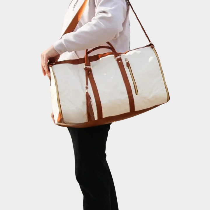 Open women's 2-in-1 garment duffel revealing spacious interior, suit compartment, and organized pockets.