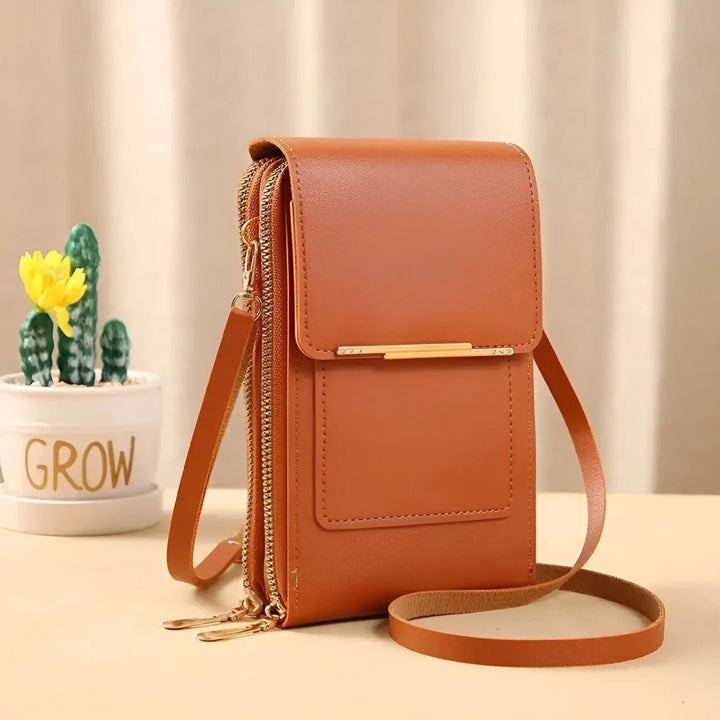 Vibrant red anti-theft leather shoulder bag for women, offering RFID security for travel.