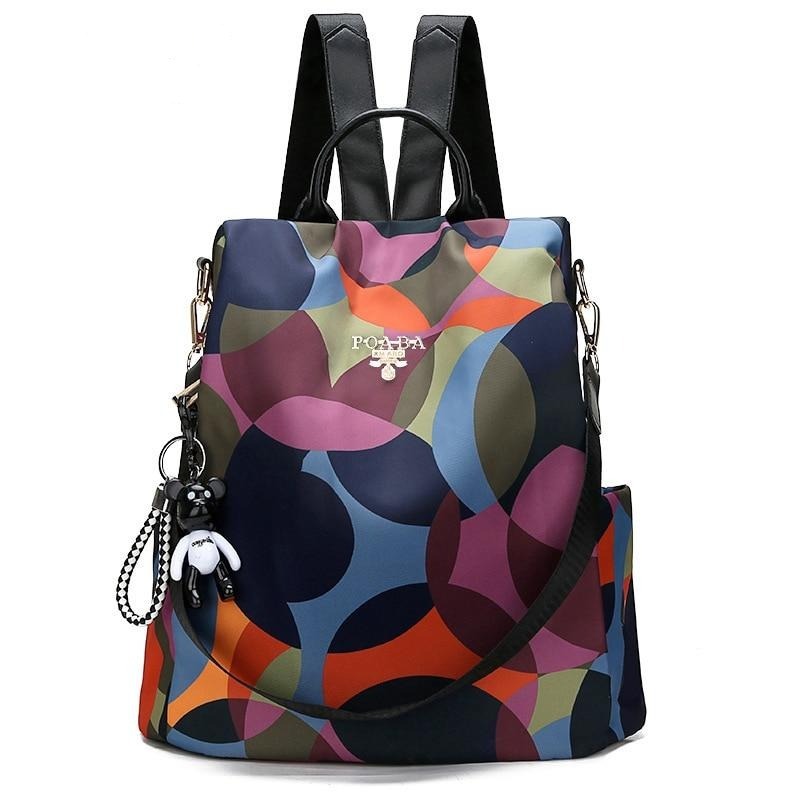 Stylish women's anti-theft oxford fabric backpack, water-resistant for daily use.