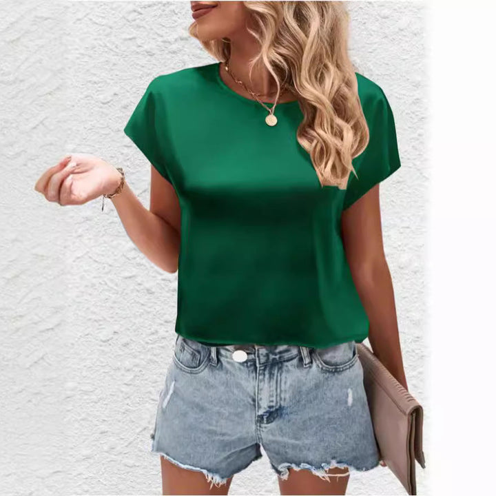 Stylish women's batwing sleeve top with a round neck. Effortless comfort for everyday wear.