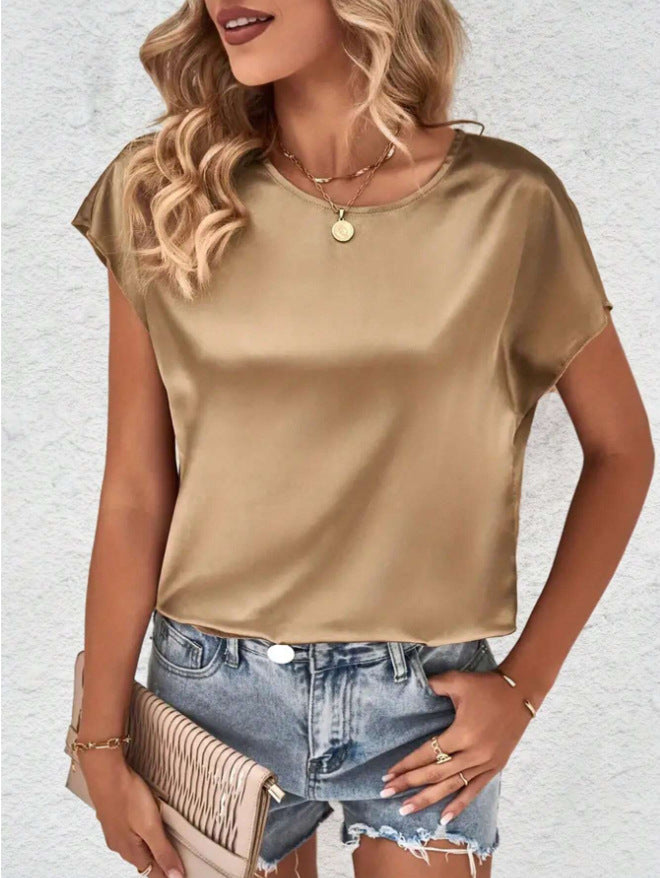 Elegant women's batwing sleeve top with a classic round neck. Loose, comfortable fit for any occasion.