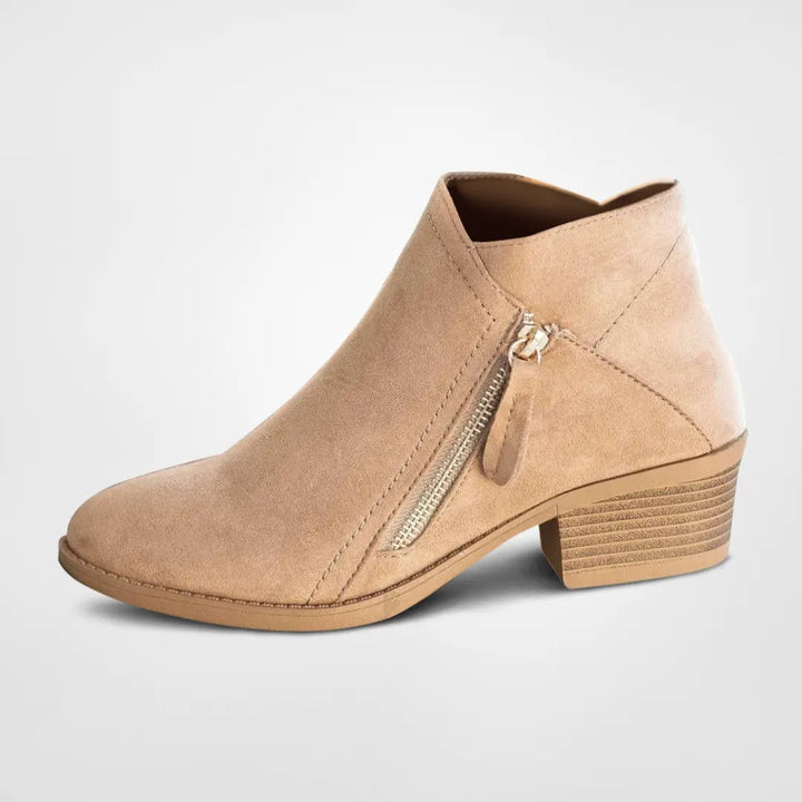 Chic women's heeled ankle boots with an easy-on zipper, ideal for stylish fall and winter wear.
