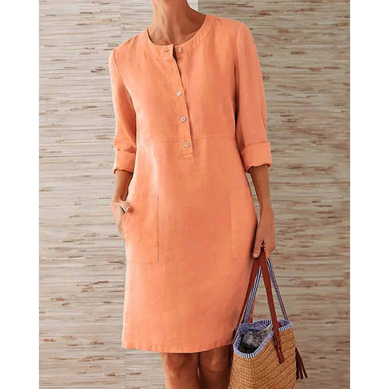 Knee-length casual dress for women, with a flattering round neckline, functional pockets, and comfortable long sleeves.