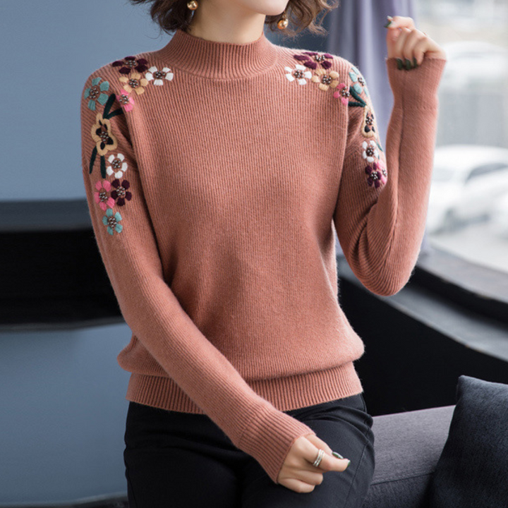 Comfortable floral print women's sweater for versatile spring & autumn fashion. Loose fit, crew neck top.