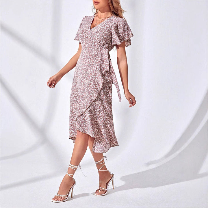 Stylish women's floral wrap summer dress with ruffled V-neck. Perfect knee-length casual wear for vacation.