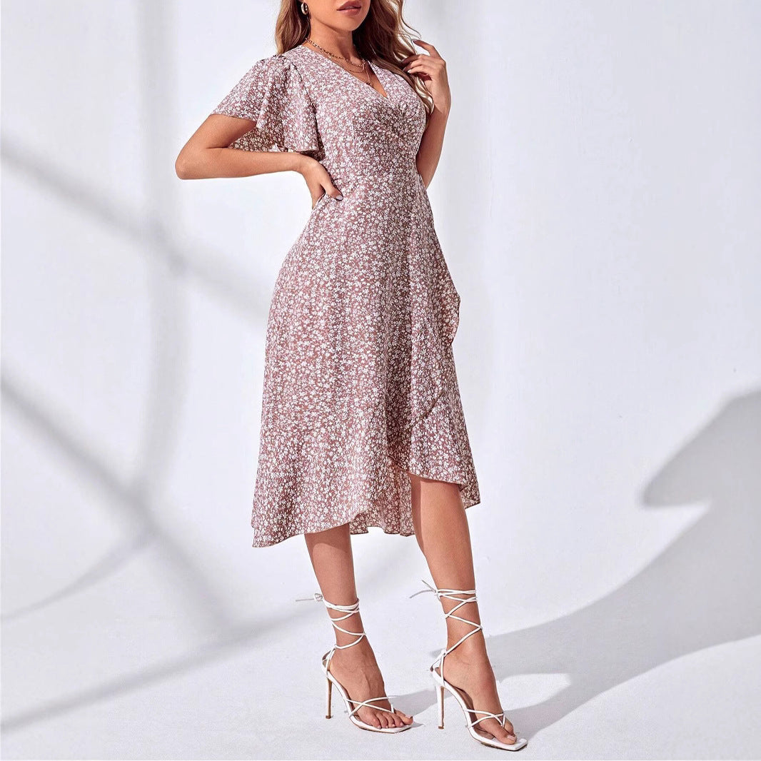 Women's knee-length floral wrap dress with a chic ruffled V-neck. A stylish and lightweight summer dress for any occasion.