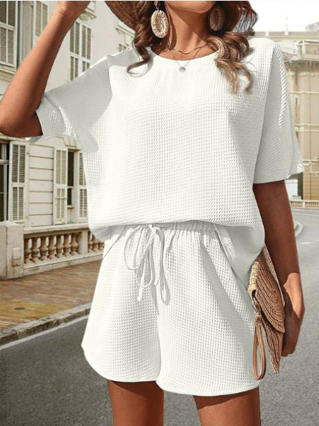 Stylish women's lightweight summer top & shorts set for casual comfort and everyday wear.