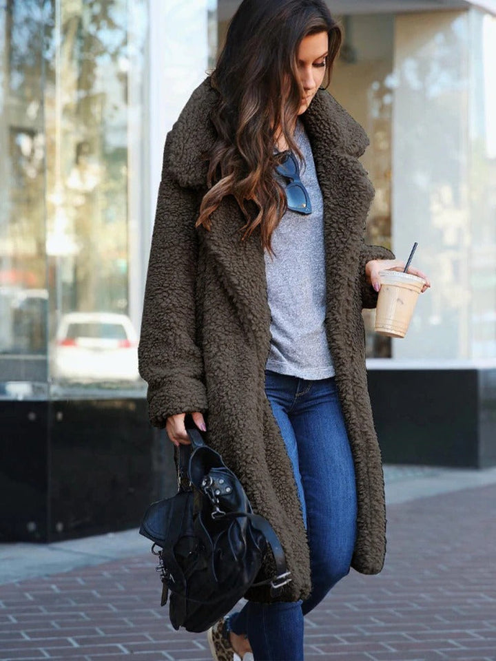 Oversized long teddy coat for women, warm, stylish & comfy, ideal for trendy winter fashion.