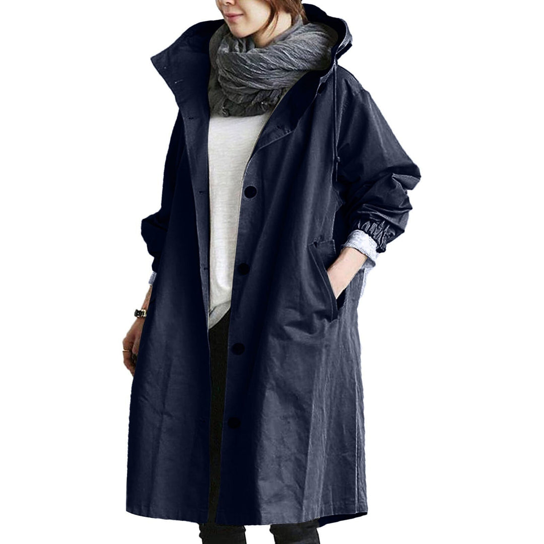 Elegant women's long trench coat style raincoat, waterproof and windproof, offering chic casual everyday protection.