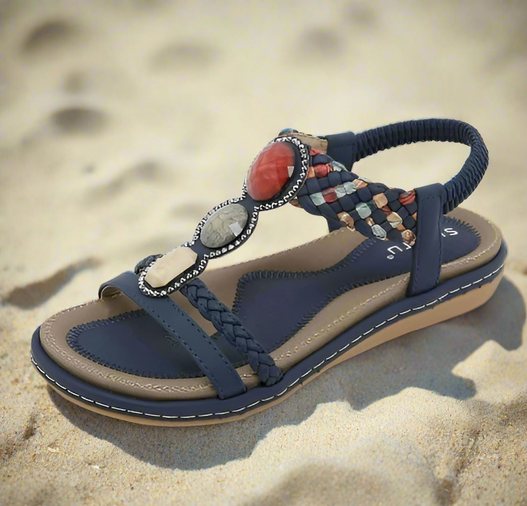 Elegant open toe women's low sandals, offering ergonomic comfort for stylish daily wear & summer activities.