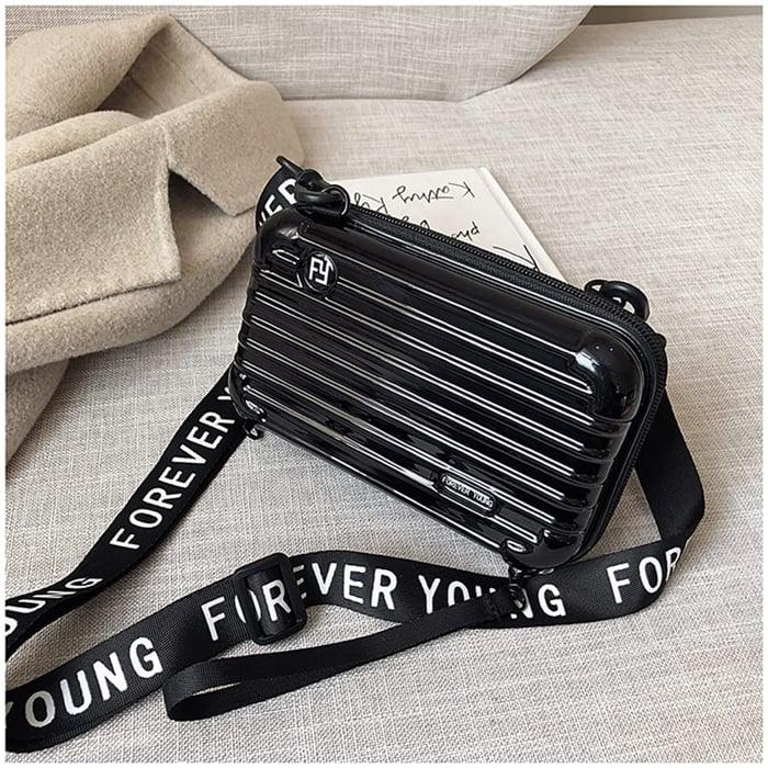Compact women's travel shoulder bag, ideal for weekend getaways & essential daily carry.