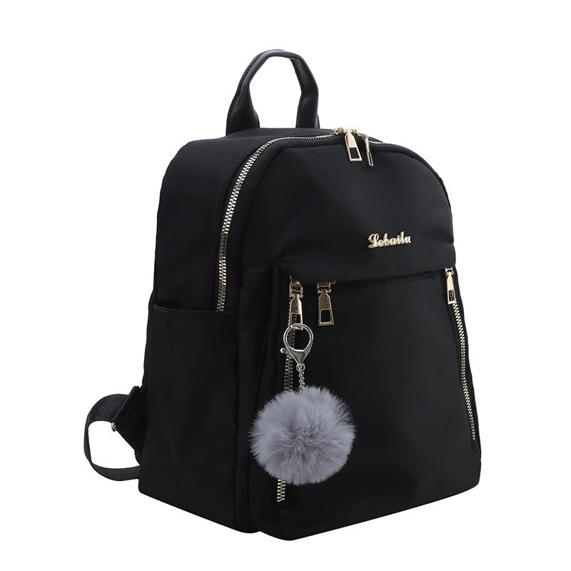 Front view of a chic women's PU leather travel backpack with secure zippers & spacious main compartment.