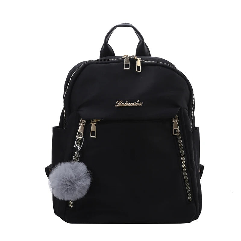 Open women's PU leather travel backpack revealing organized storage pockets for essentials & gadgets.