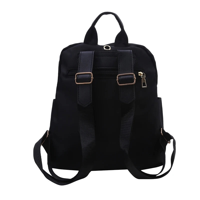 Back view of versatile women's PU leather backpack, featuring adjustable shoulder straps & anti-theft pocket.