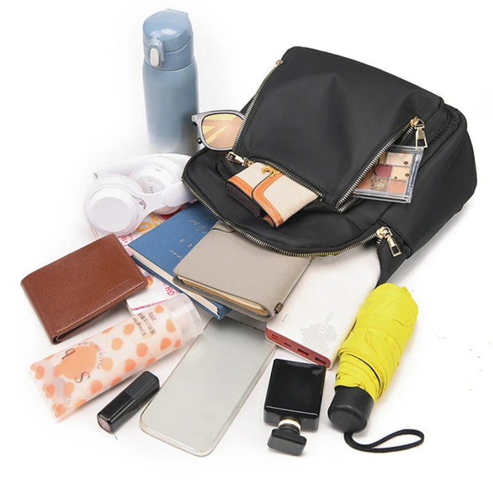 Lightweight women's PU leather fashion backpack, offering comfort & style for versatile travel & daily needs.