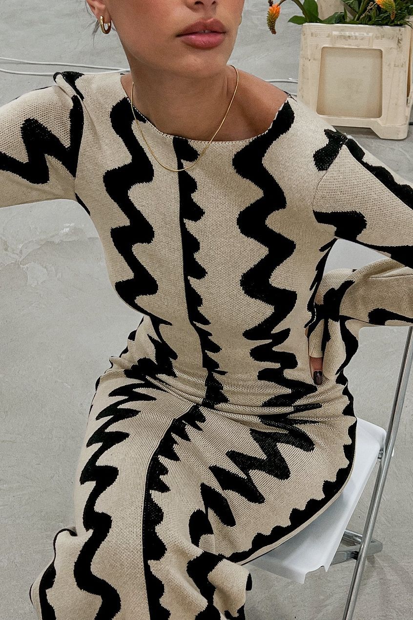 Versatile women's summer midi dress featuring an elegant wave pattern, ideal for day to evening wear.
